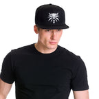Produktbild Witcher - Wolf Medaillon Snapback Cap schwarz