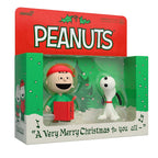 Image produit Peanuts ReAction Lot de 2 figurines articulées Charlie Brown et Snoopy (Chants de Noël) 10 cm
