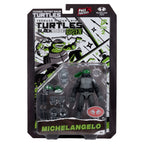 Productafbeelding Teenage Mutant Ninja Turtles Page Punchers actiefiguur Michelangelo (Black White & Green) (Red Platinum Edition) 13 cm