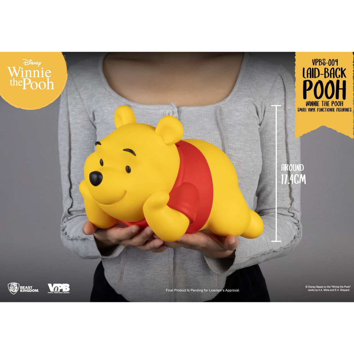 Image produit Winnie l'Ourson Petite tirelire en vinyle Winnie allongé 17 cm